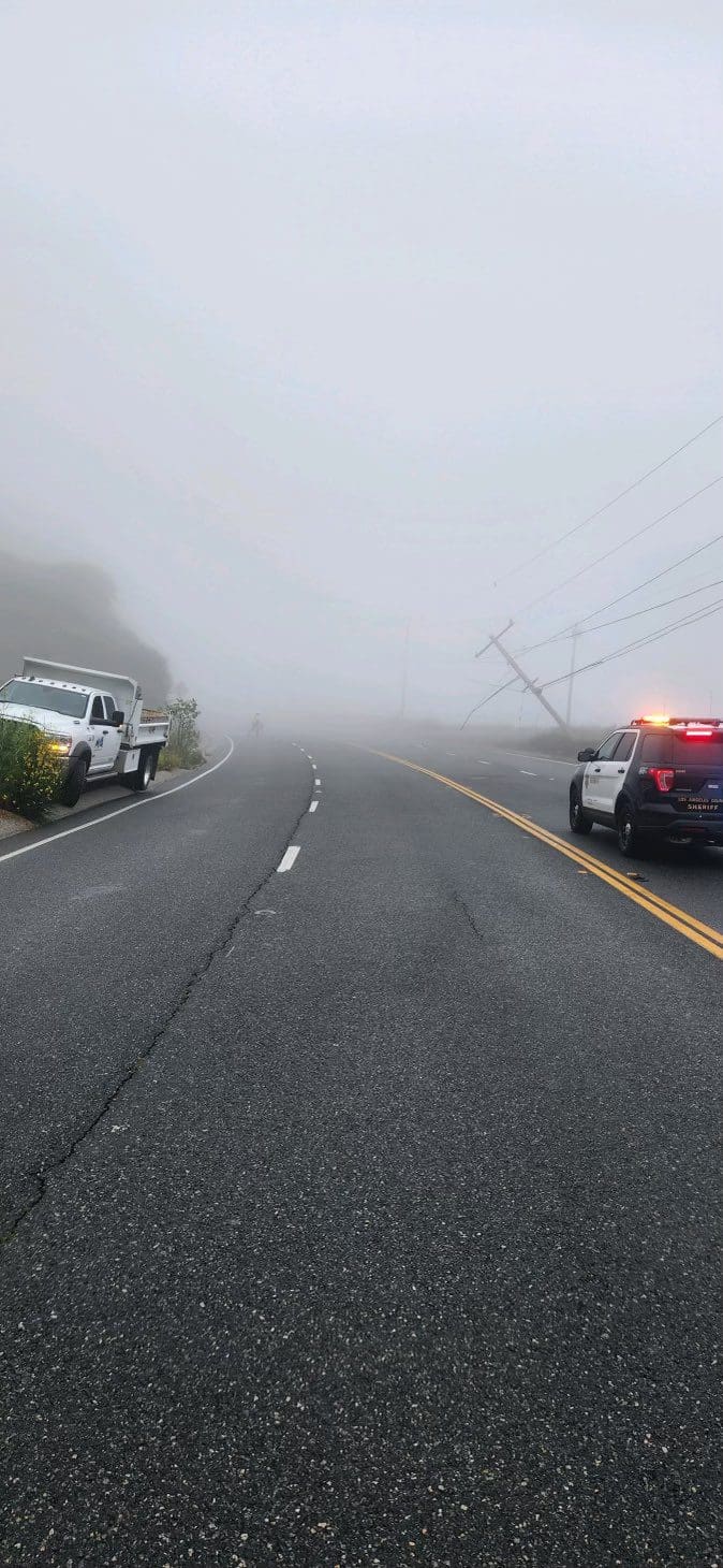 Kanan Dume Rd closed due to down power pole, use alternative route