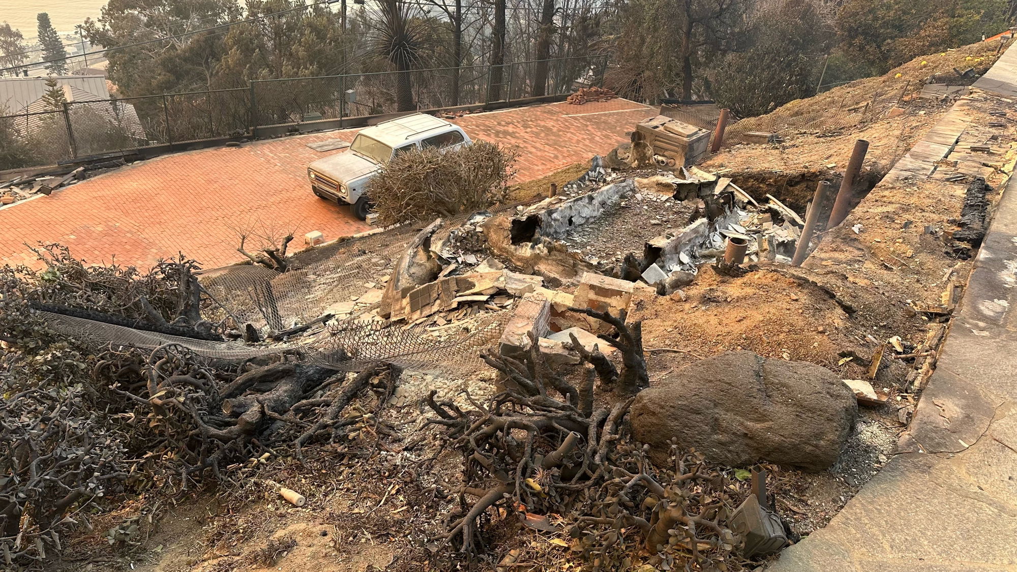 Malibu and Palisades residents prepare for debris removal and rainfall risks