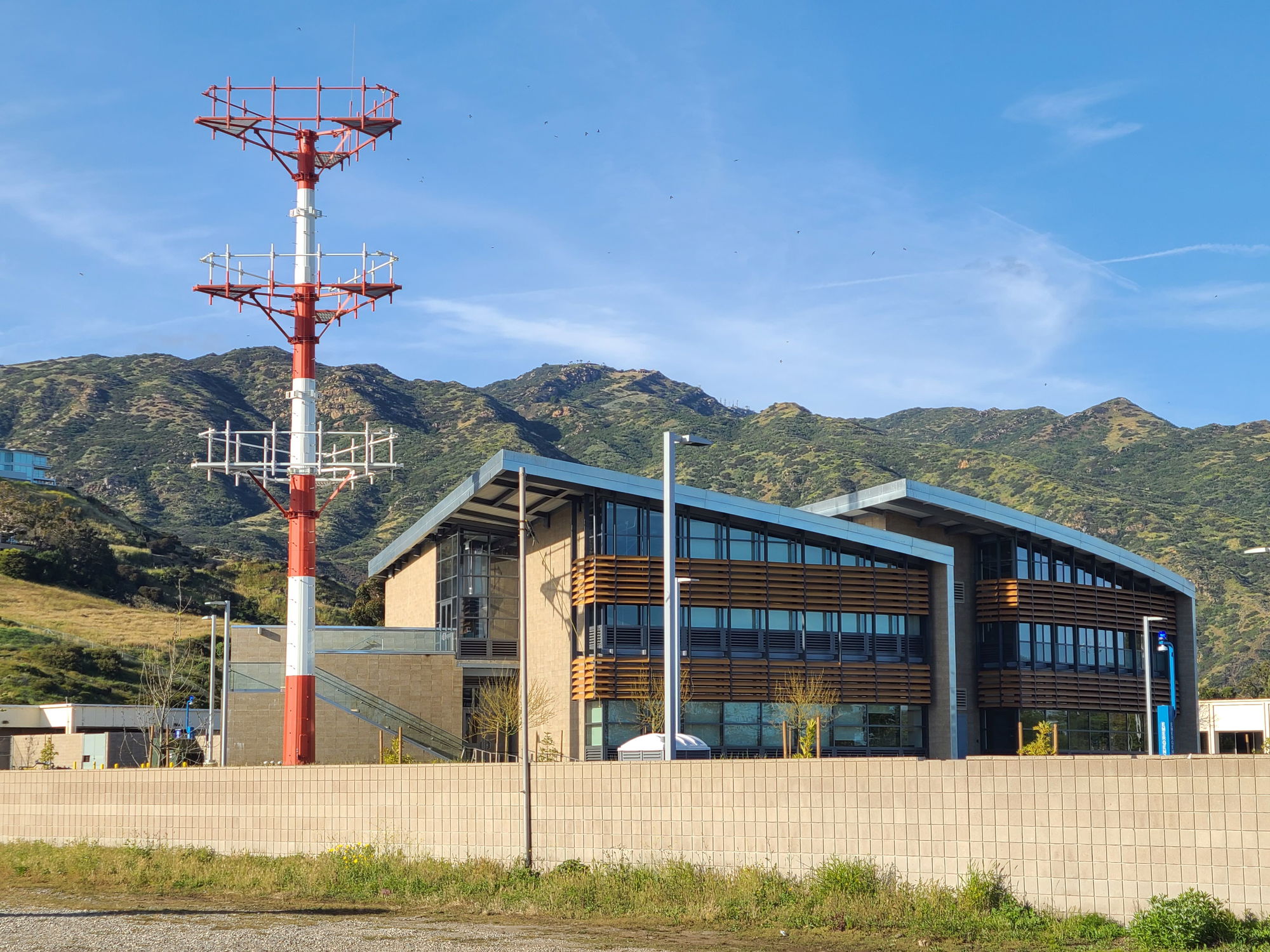 Residents rally against antenna tower at SMC Campus