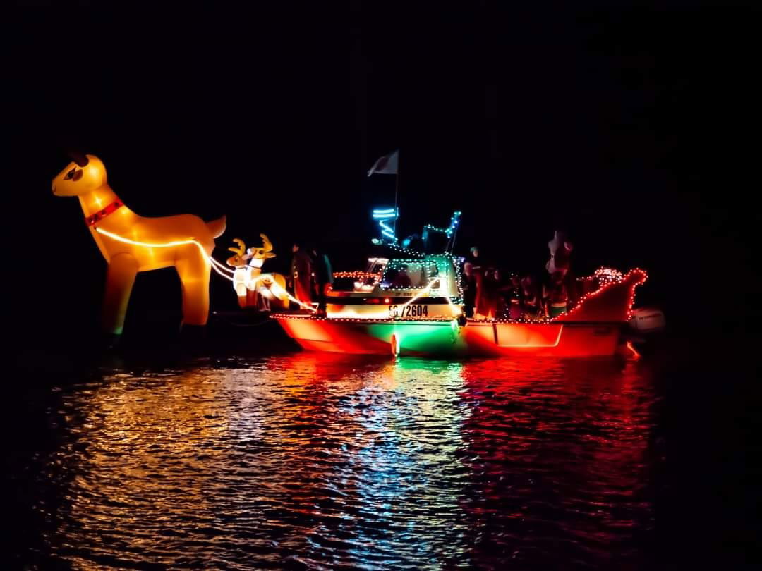 Morro Bay Rotary Hosts Annual Lighted Boat Parade and Santa House