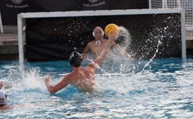Sharks water polo win one, lose one in postseason