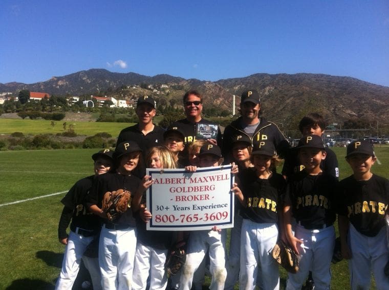 Malibu Little League Presents Plaque to Sponsor
