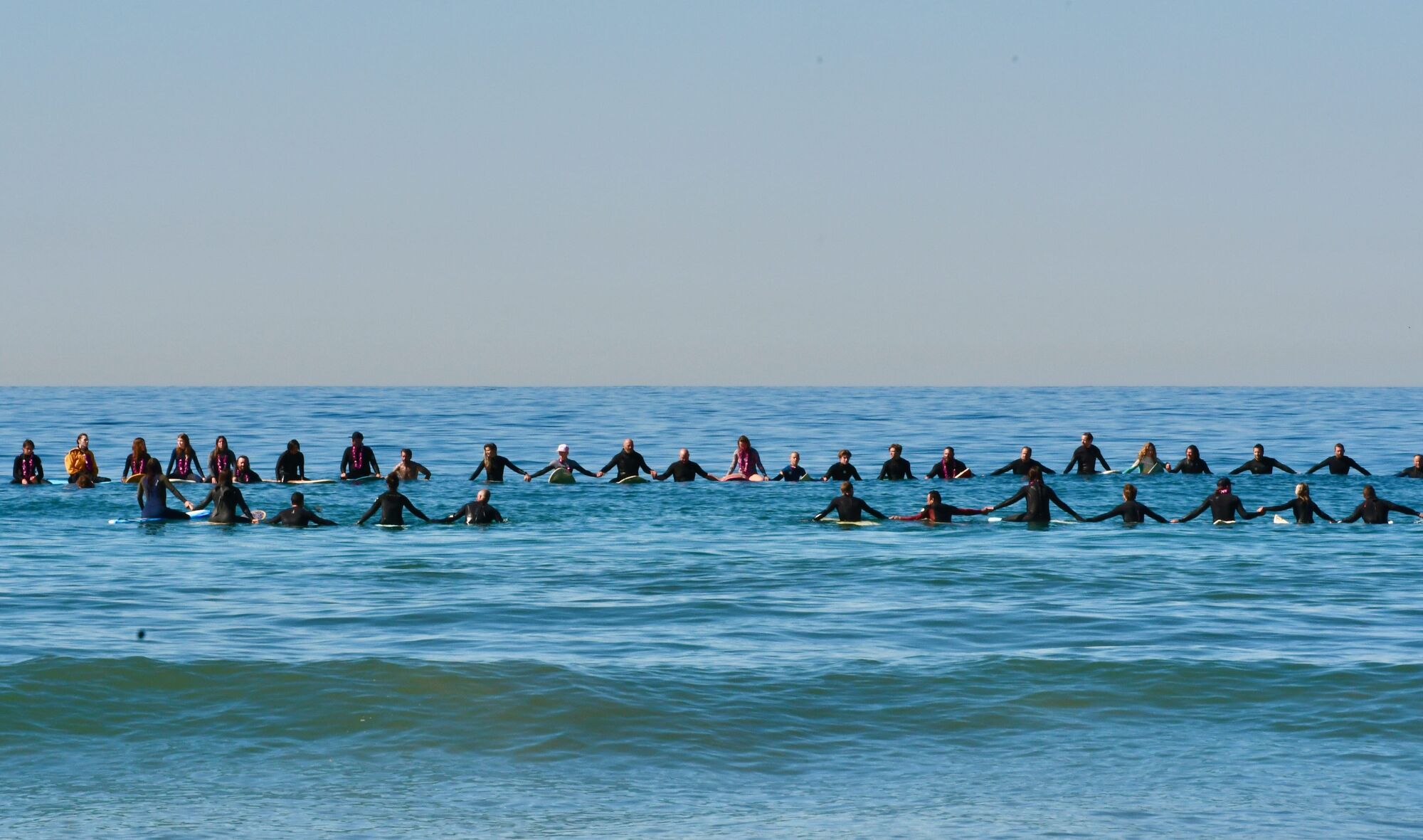 Paddle out memorial held for local hero and friend