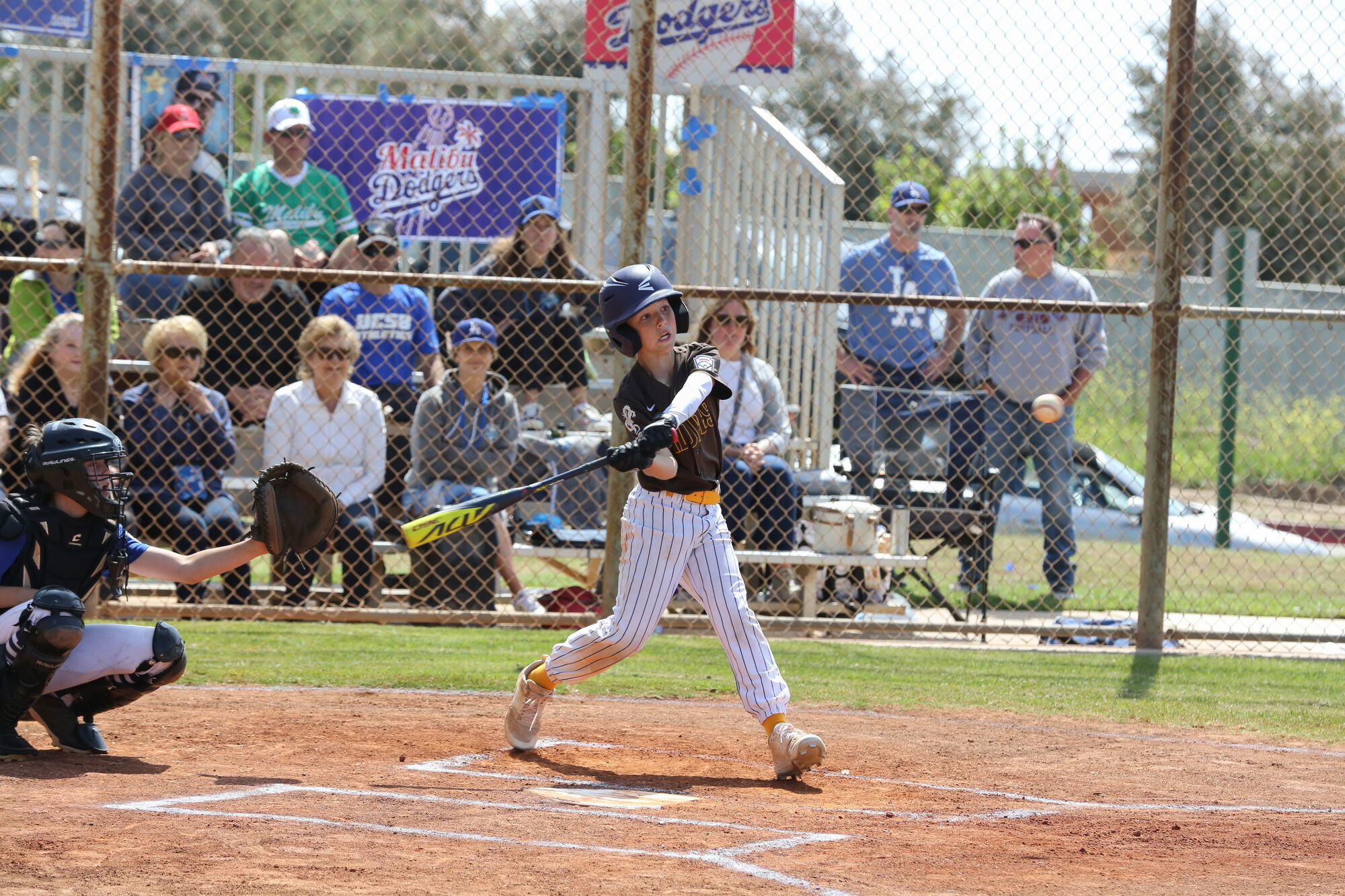 Local Little League All-Stars hitting tournament diamonds