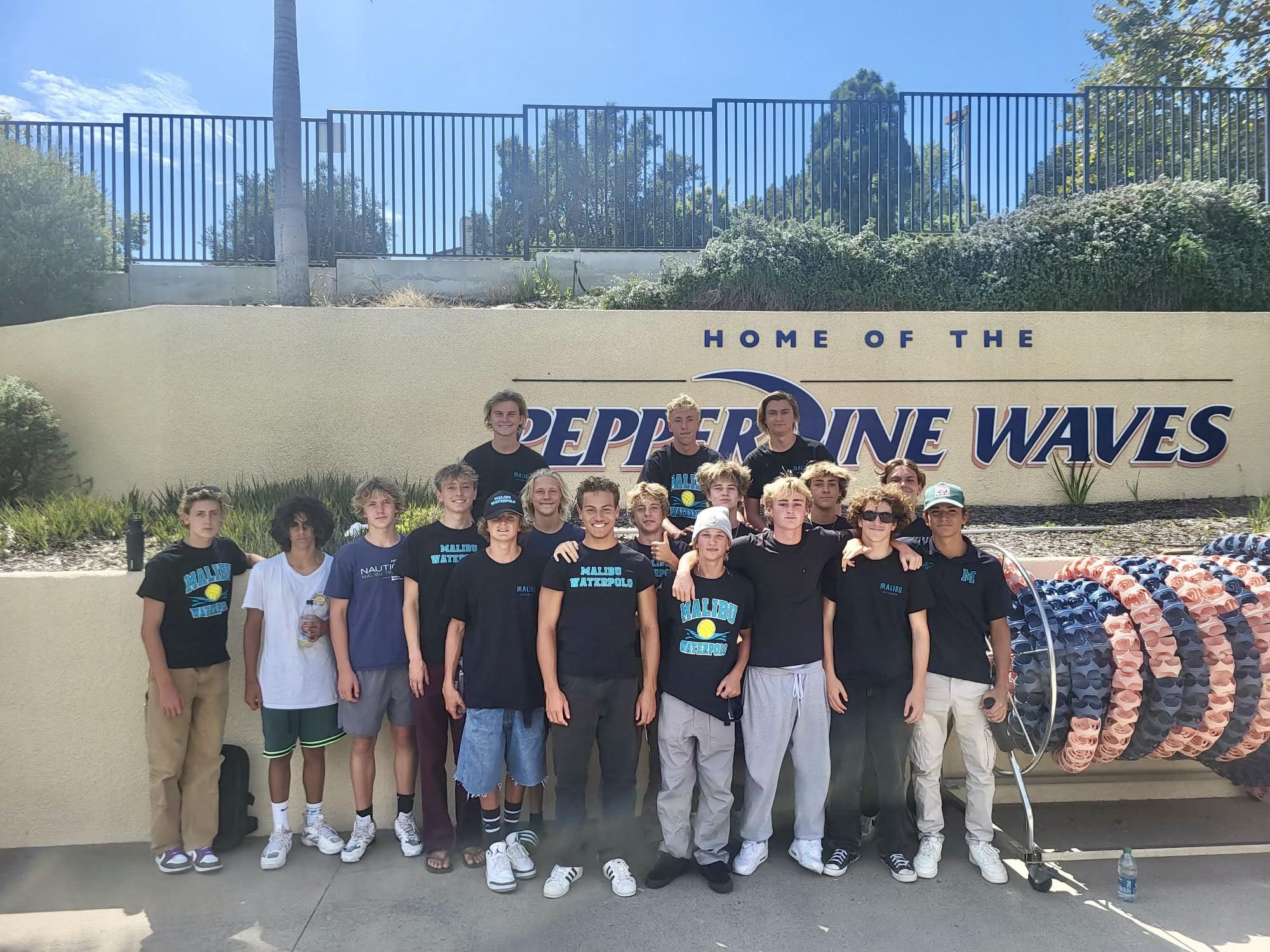 Shark boys water polo attends Waves men's water polo contest