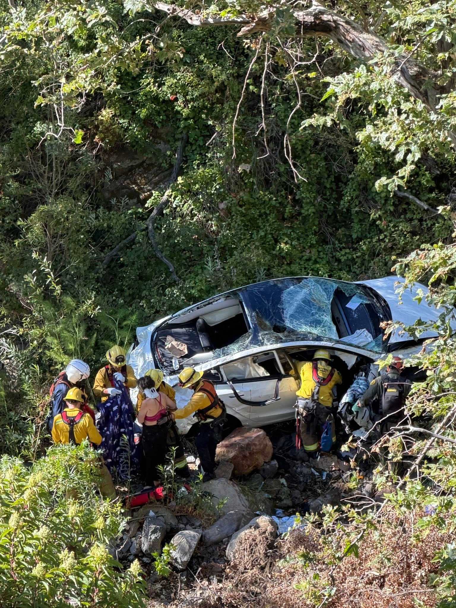 Two injured after Tesla plunges 300-feet off Mulholland Highway