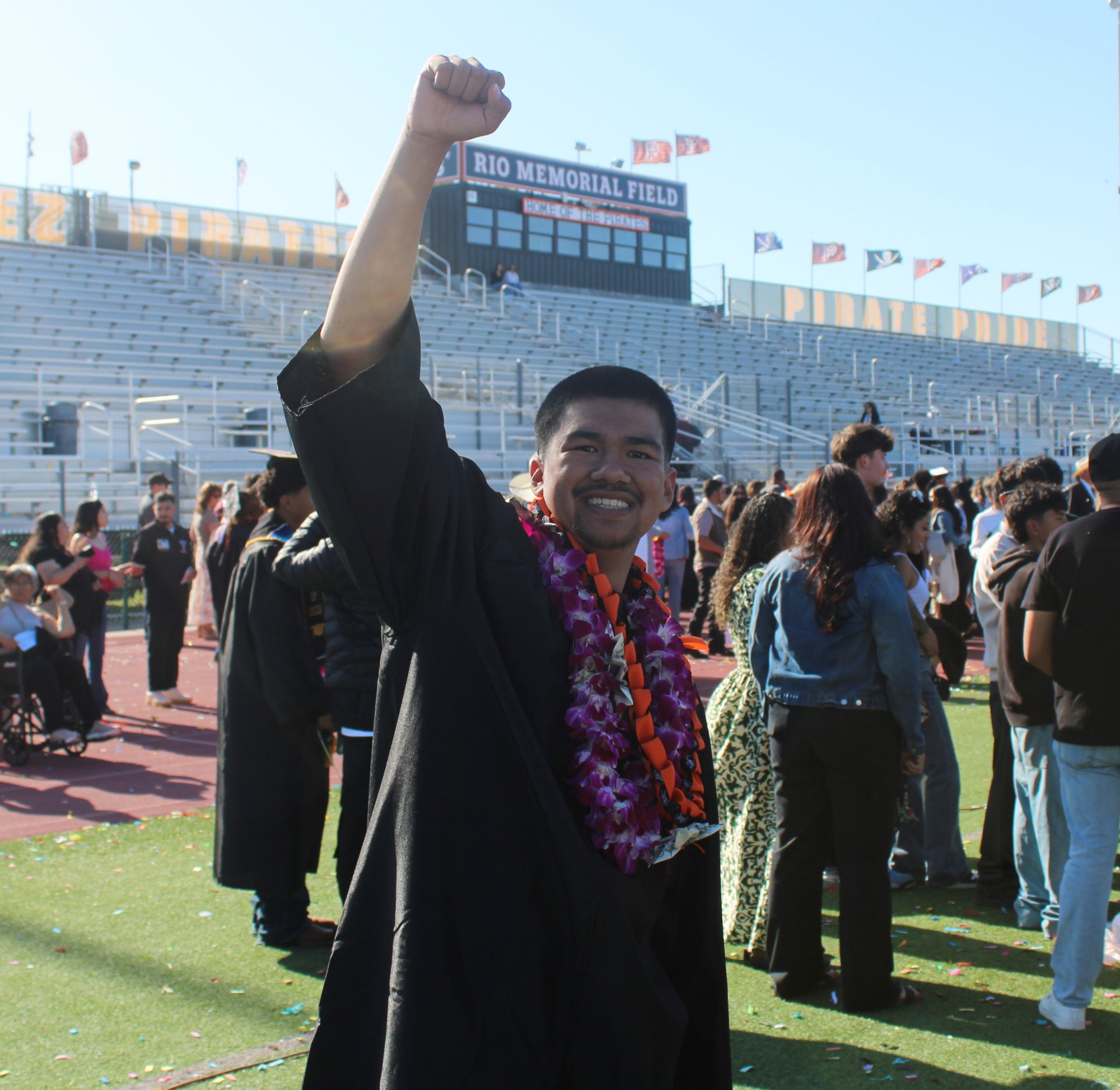 New Class of 2026 graduate Justin Vaca gives his best “I made it” pose after the Santa Ynez High graduation ceremony on Friday, May 29. Photo by Mike Chaldu/SYVS