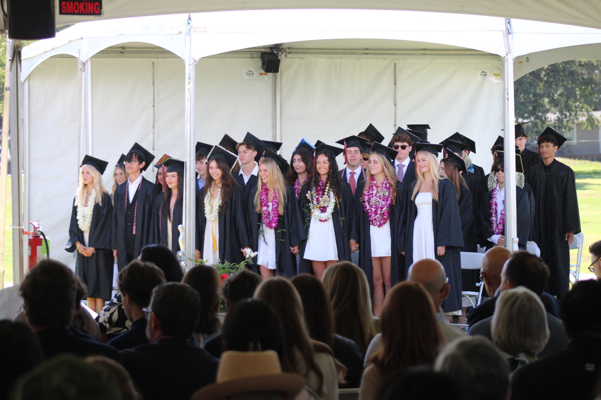 The Dunn School's Class of 2026, consisting of 38 seniors, stand in preparation of turning their tassels to become officials graduates during their ceremony on Saturday, May 30. Photo by Mike Chaldu/SYVS