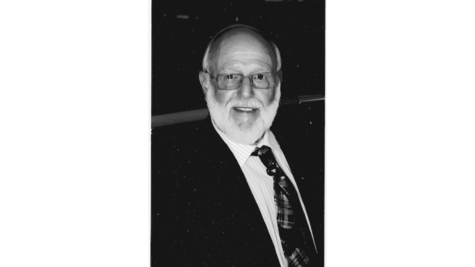 Paul E. White 1938-2026