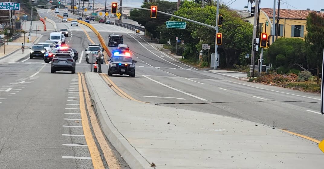 Downed power lines temporarily disrupt PCH traffic near Trancas Canyon this morning
