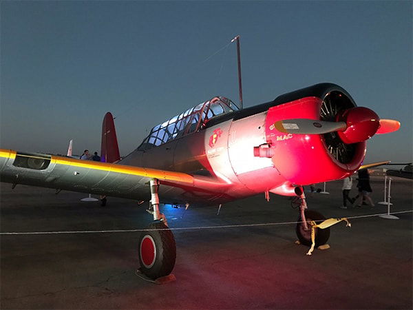 2017 Airfest plane lit up in the night.