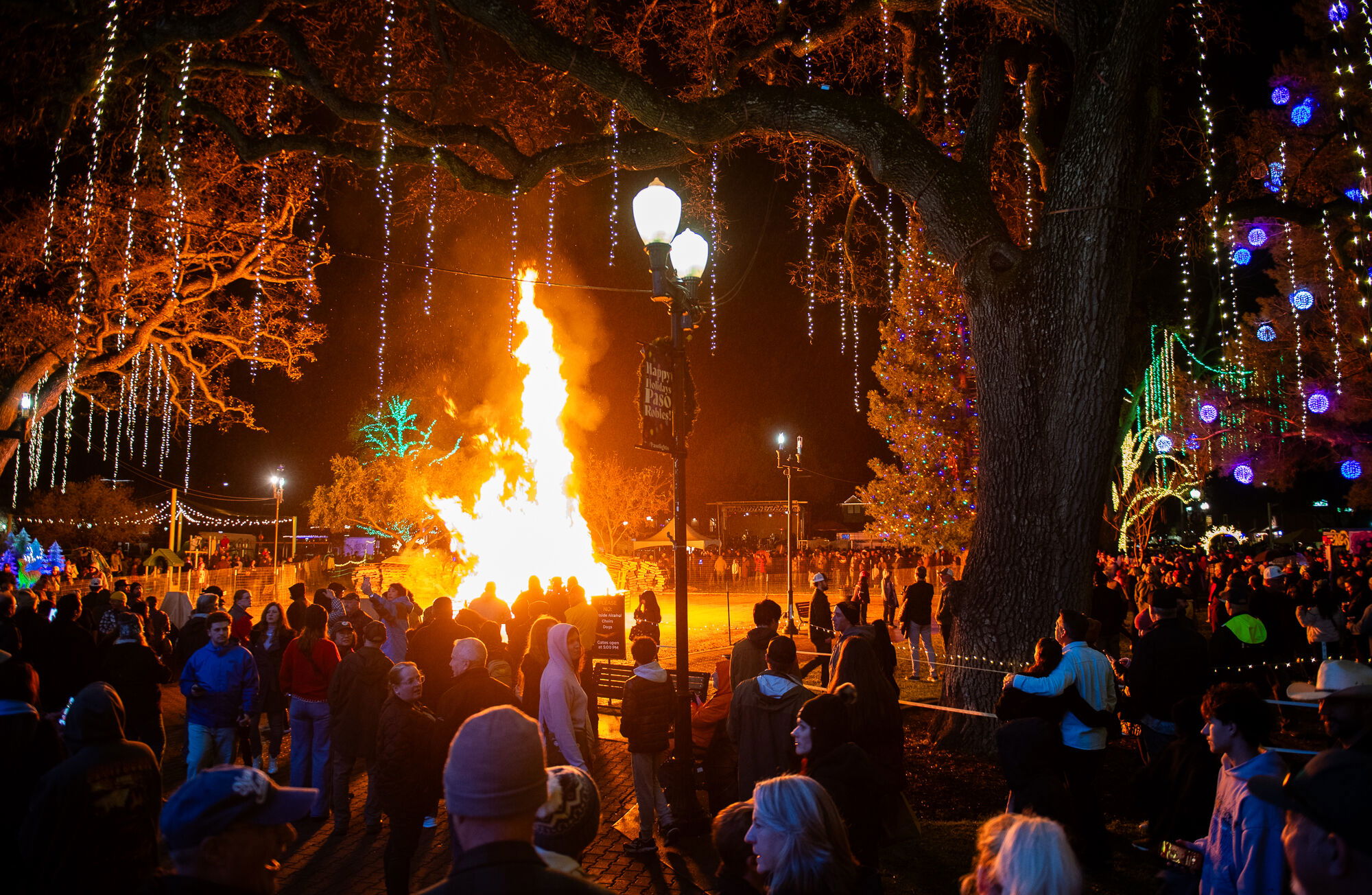 Community turns out in the rain for New Year’s Eve Bonfire