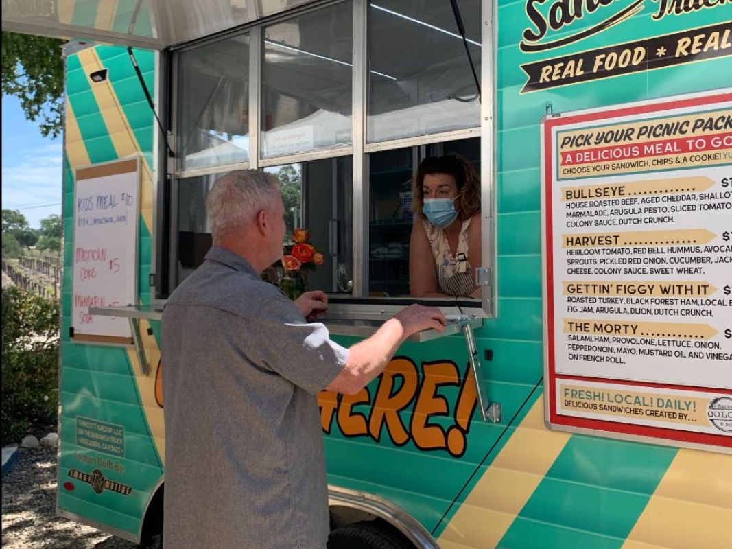 The Sandwich Truck Donates Food and Funds to ECHO