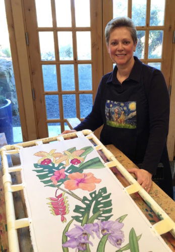 Art in the Park artist Deb Lysek with silk as her canvas.