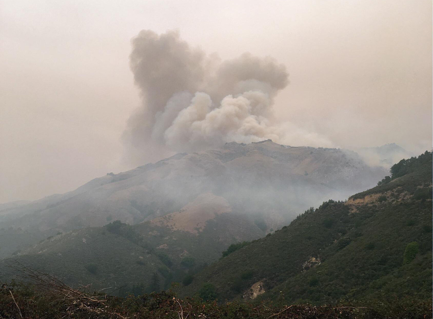 Weather Helping Firefighters Battle Dolan, Creek Fires