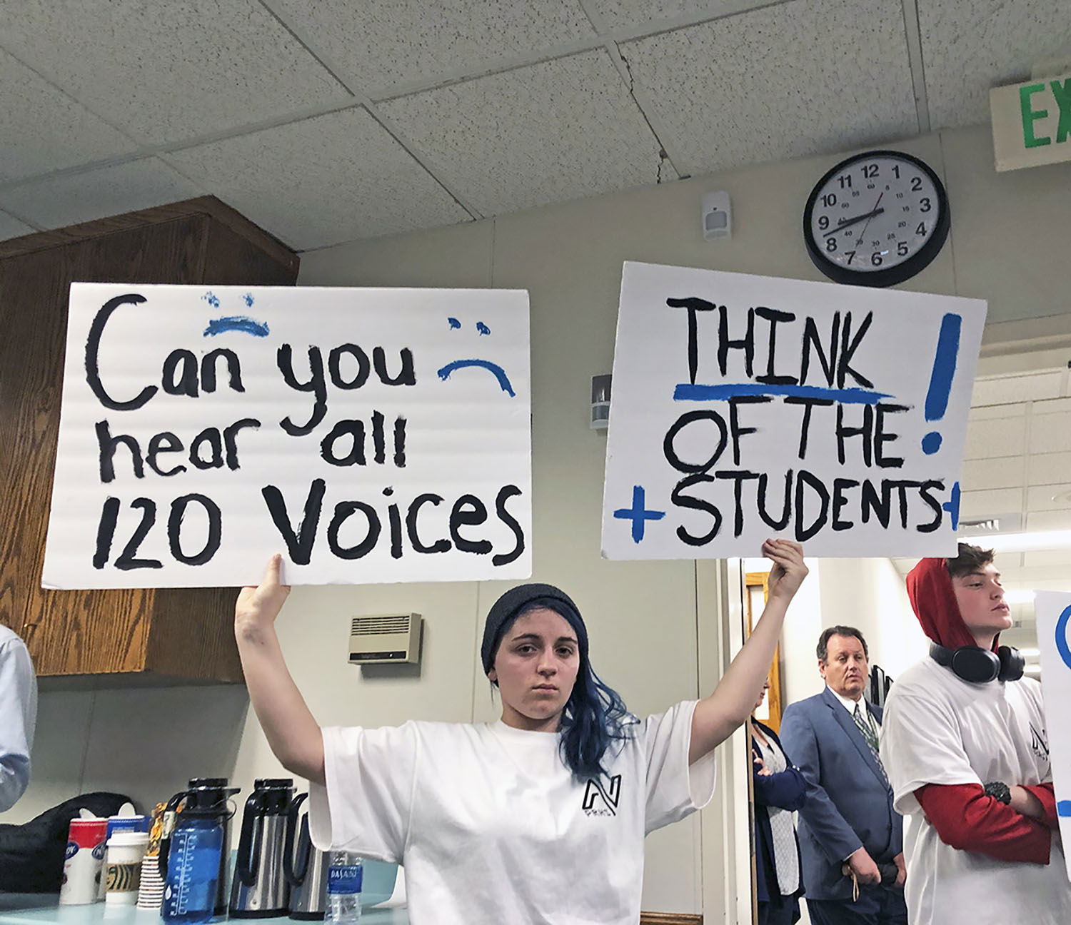 Emotions Run High as School Board Cuts Programs and Employees