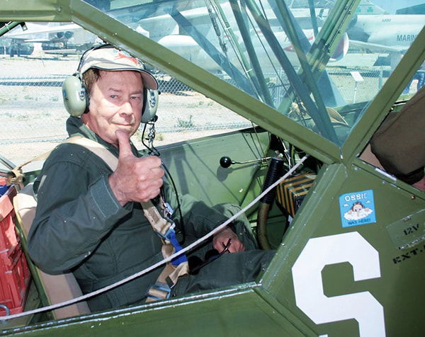 Bill Siler's son, John, gives a thumbs up.