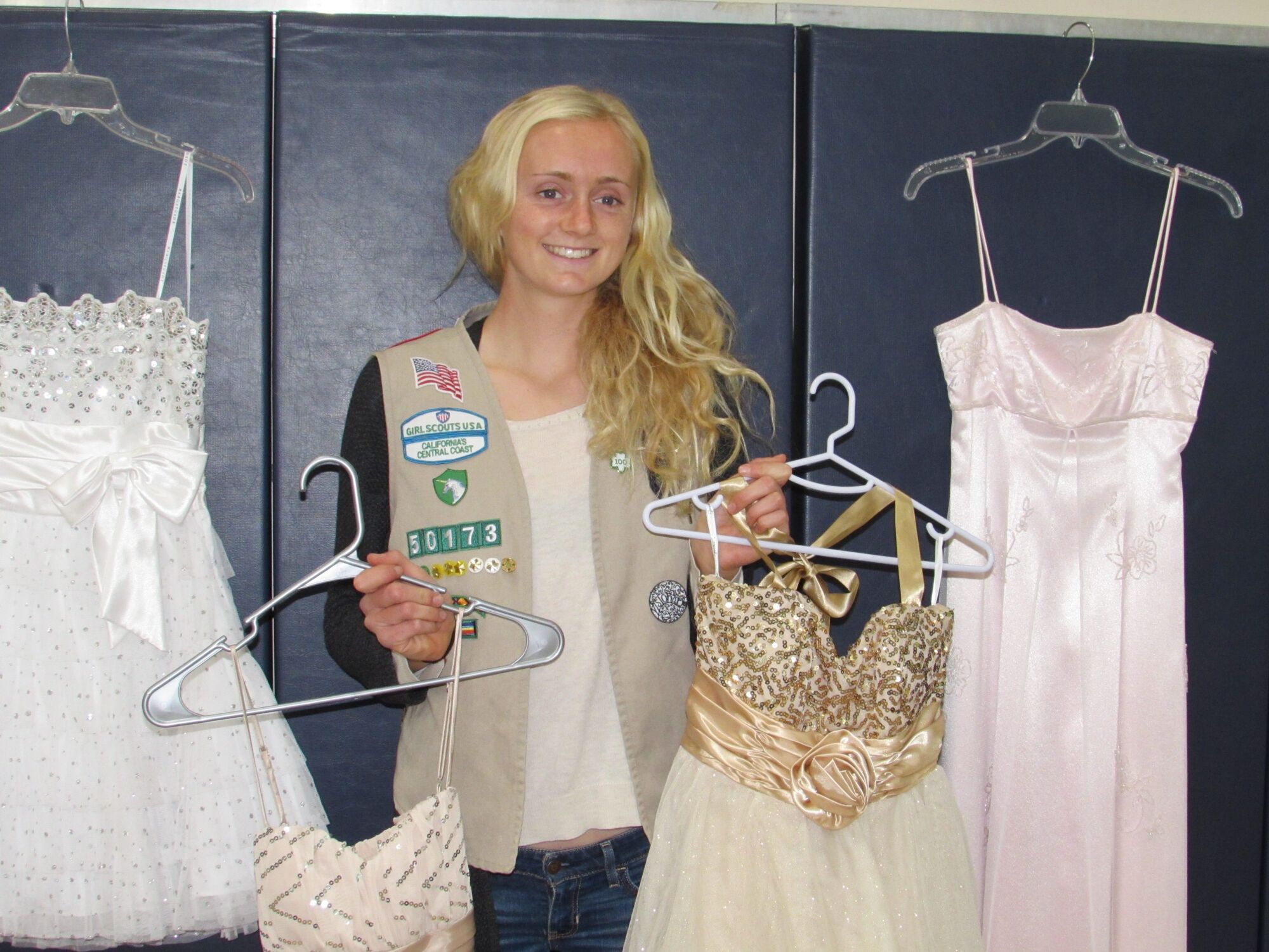 Girl Scout earning her Gold Award by donating dresses