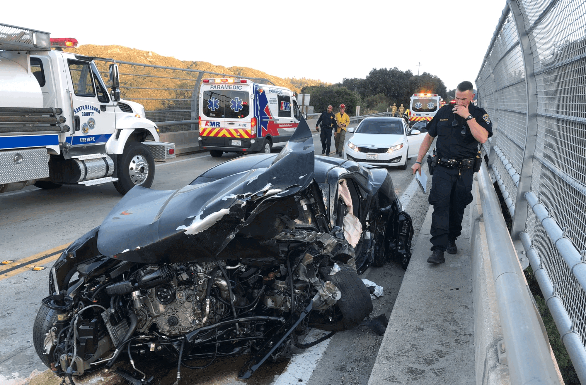 Vehicle accident sparks vegetation fire near Cold Springs Bridge