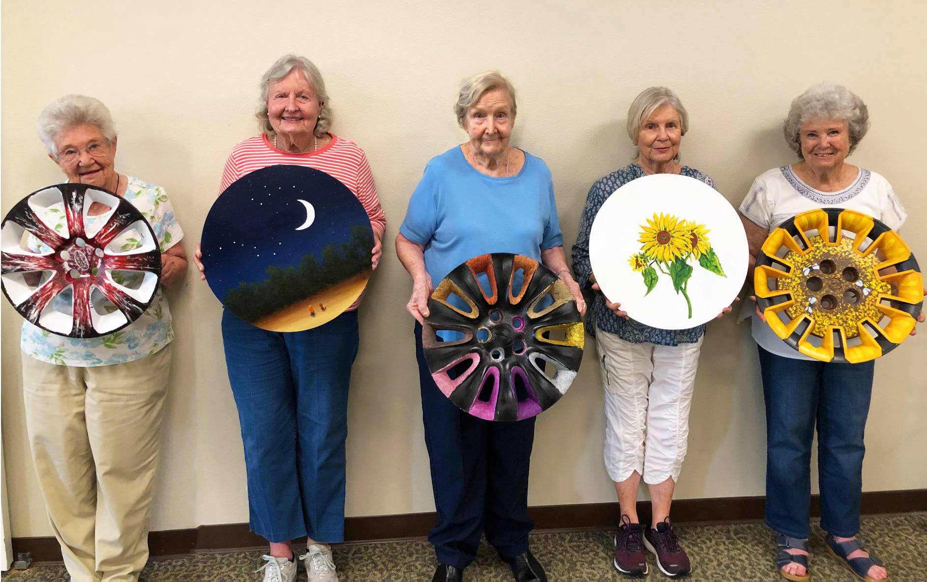 Atterdag Village residents show off hubcap artwork