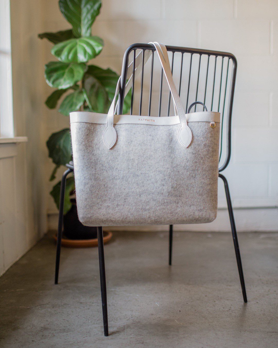 Local fashion bag designer creates label that benefits orphans