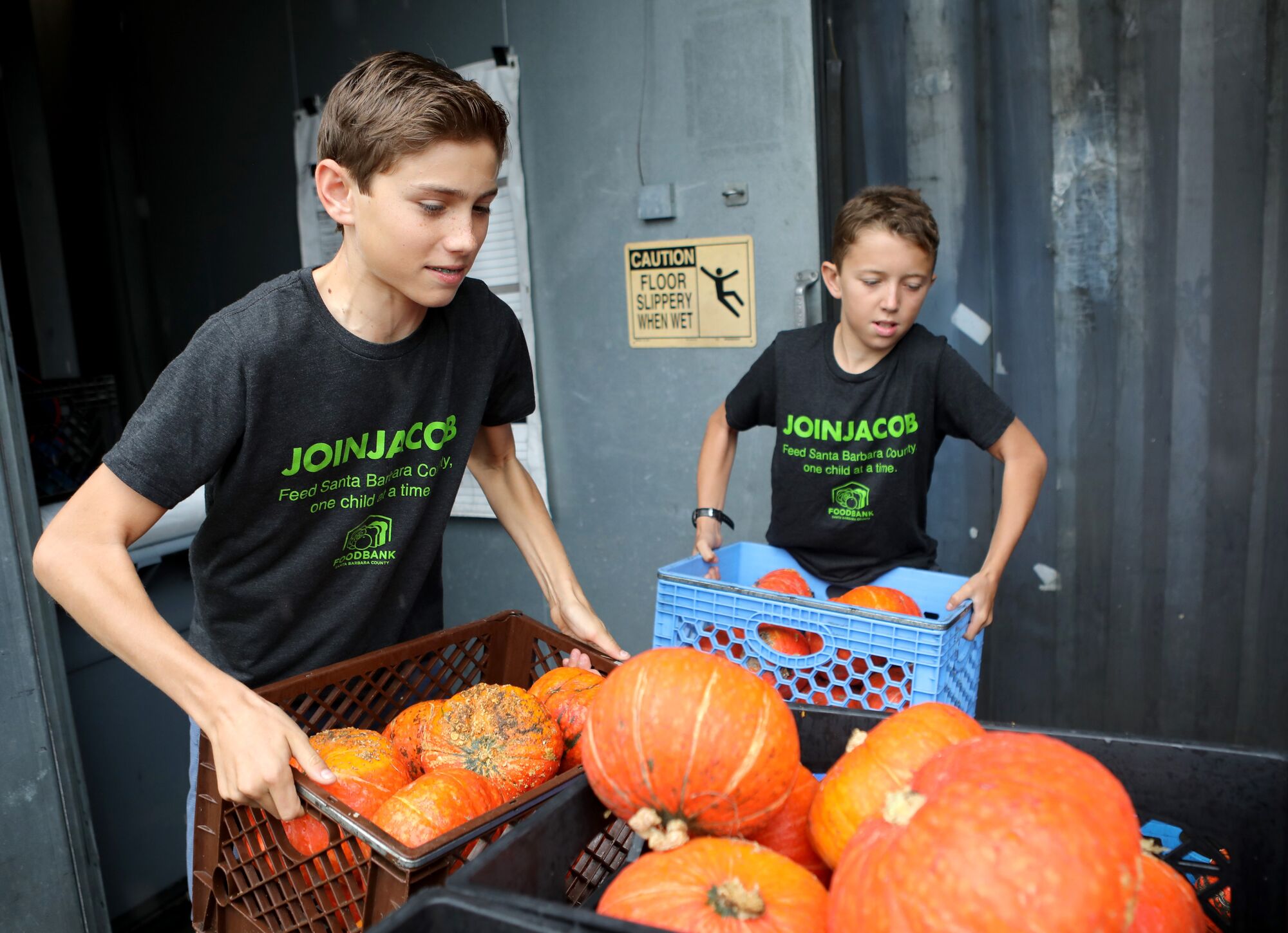 Brothers mark decade of competing in triathlon to help Foodbank